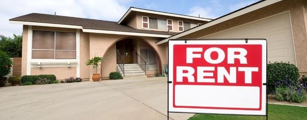House with for rent sign in front - rental property insurance